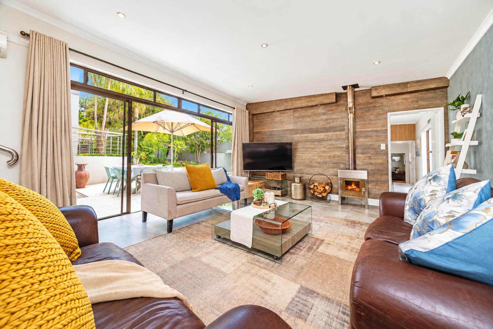 768744_Bright_Modern_Living_Room_with_Garden_Views.png