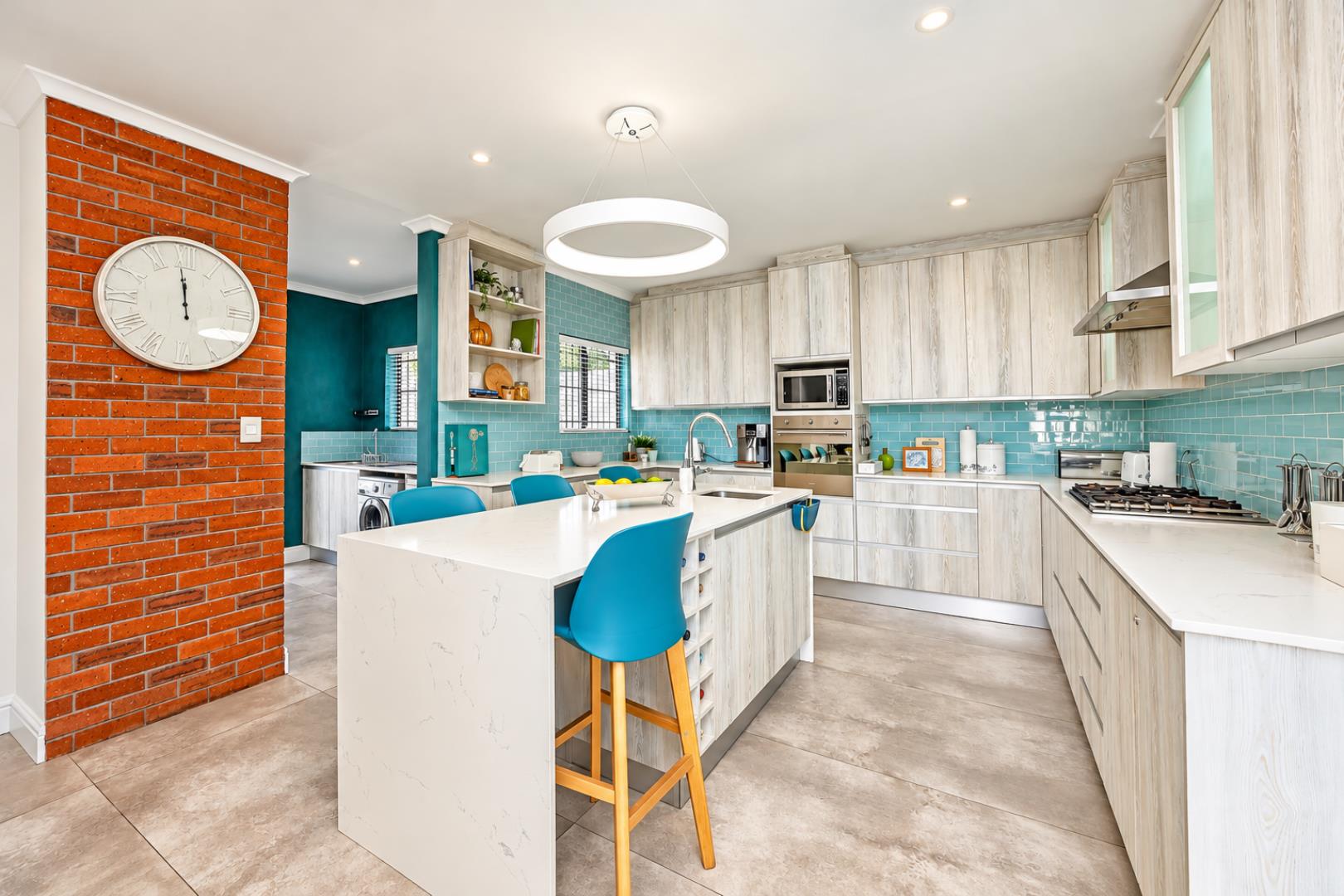 768744_Bright_Teal-Tiled_Modern_Kitchen.png