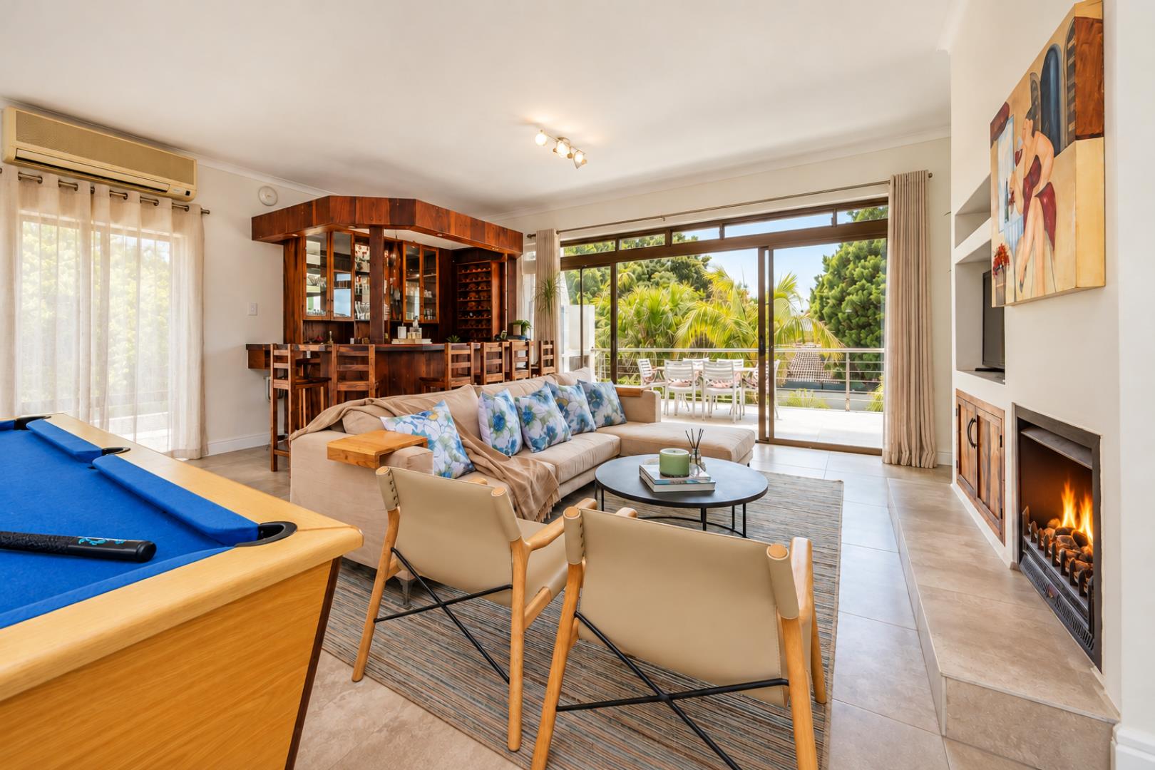 768744_Modern_Coastal_Lounge_with_Cosy_Fireplace.png