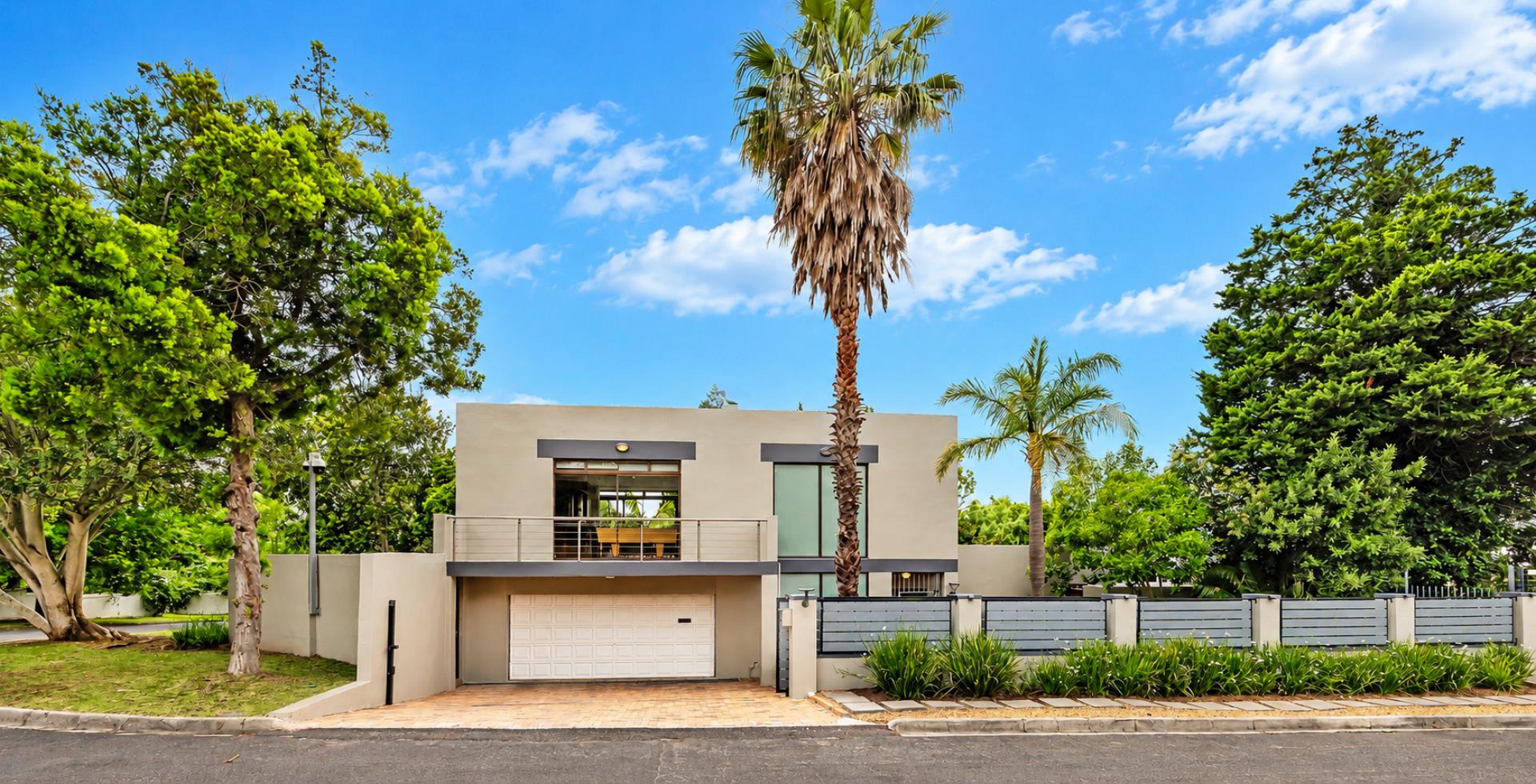 768744_Modern_Home_with_Palm-Lined_Landscaping.png