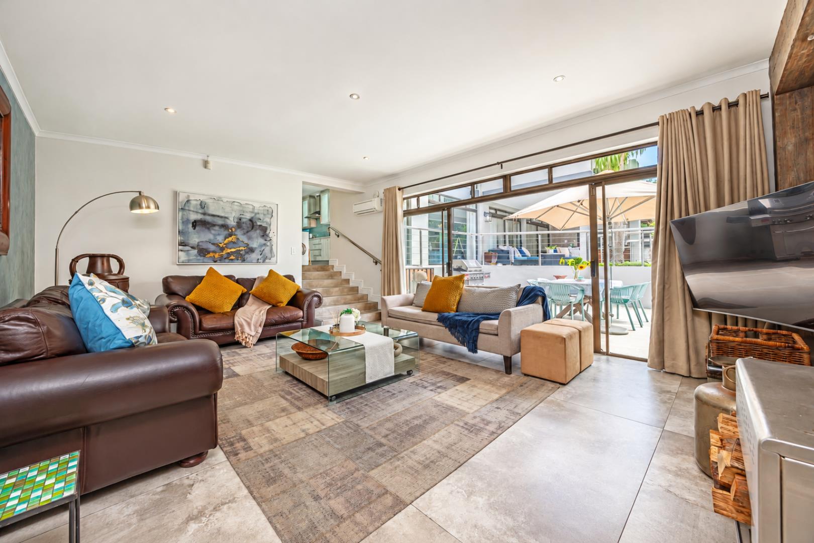 768744_Modern_Living_Room_with_Patio_Views.png