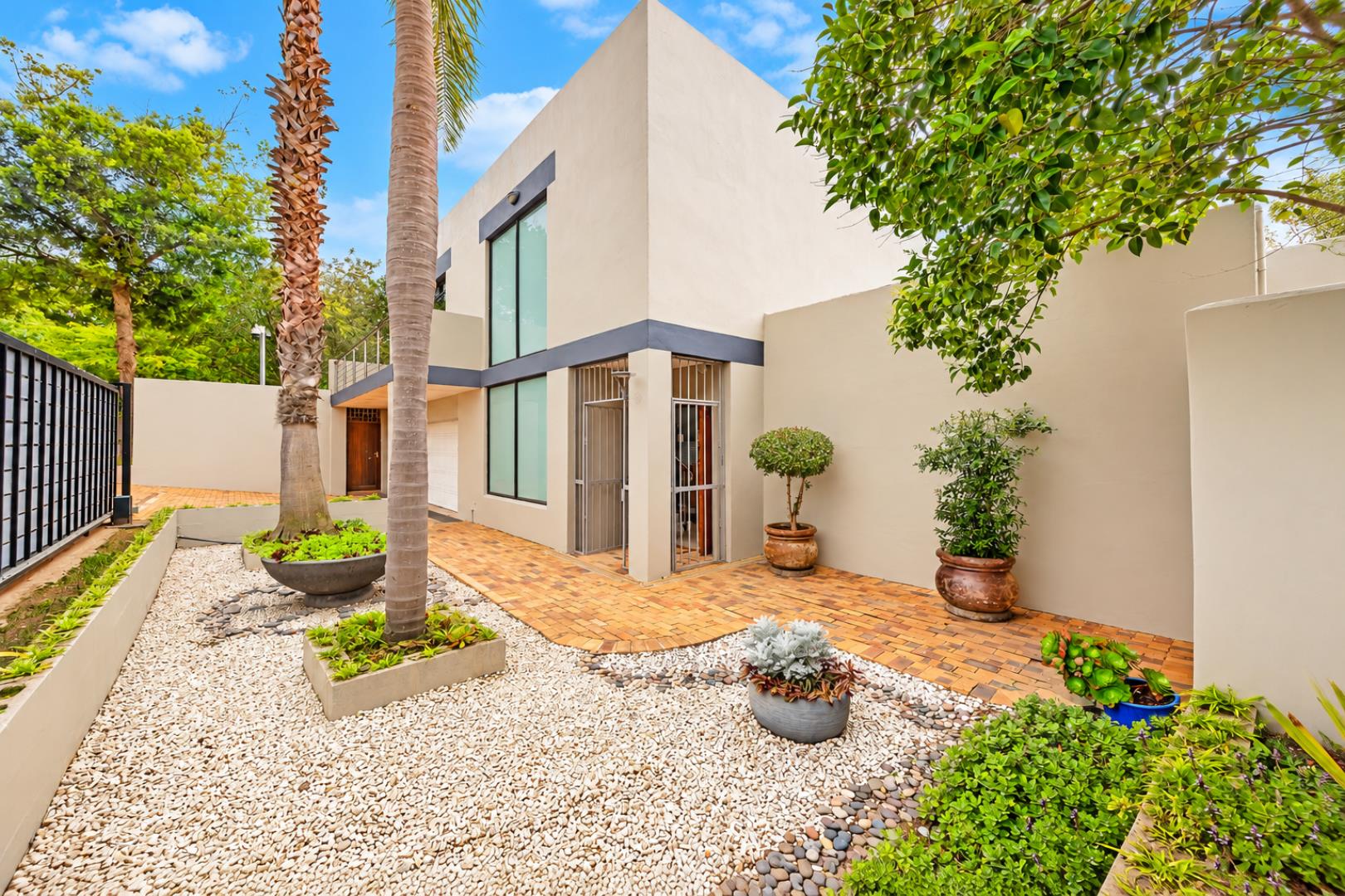 768744_Modern_Minimalist_Home_with_Lush_Courtyard.png