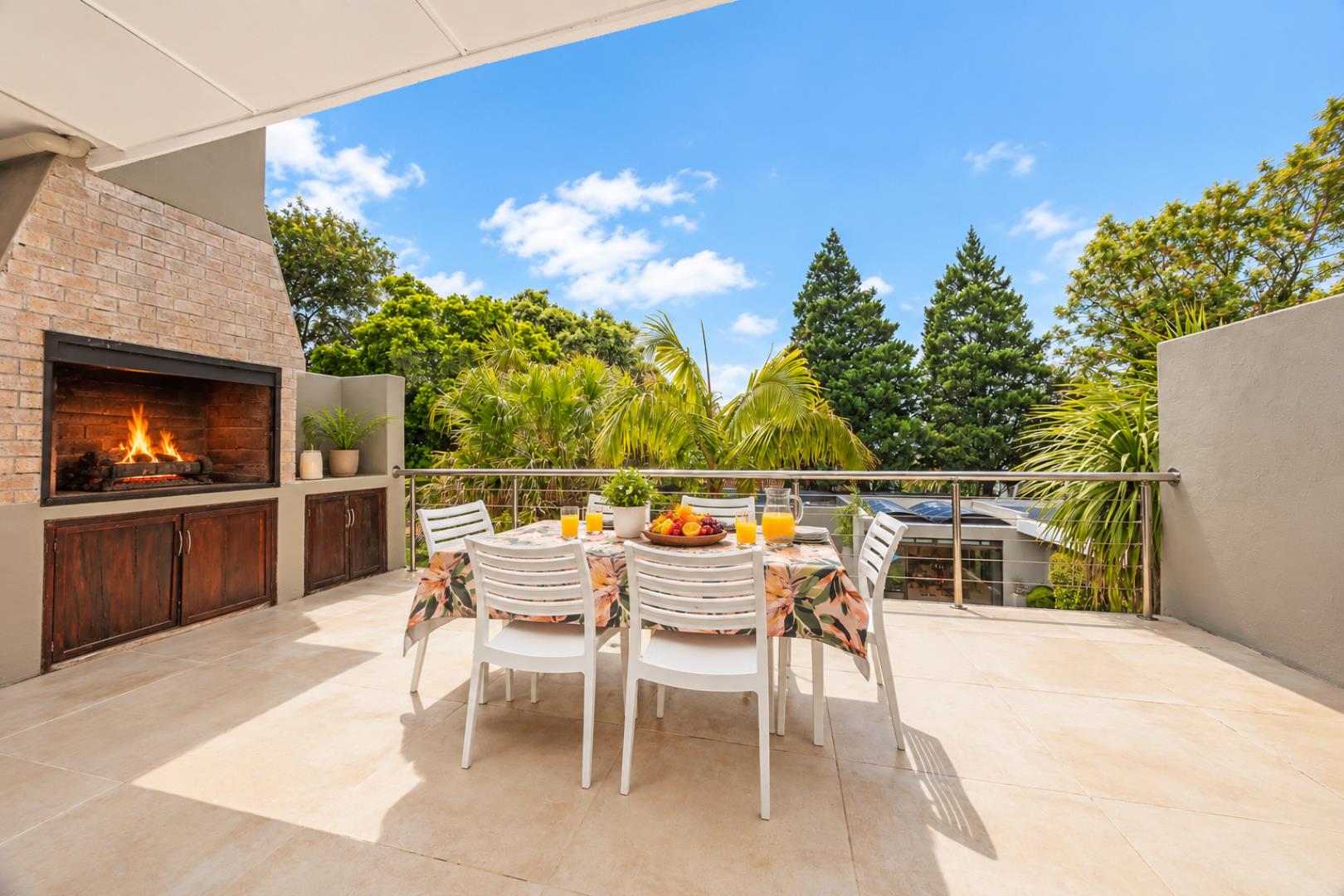 768744_Sunny_Terrace_Dining_with_Firepits.png