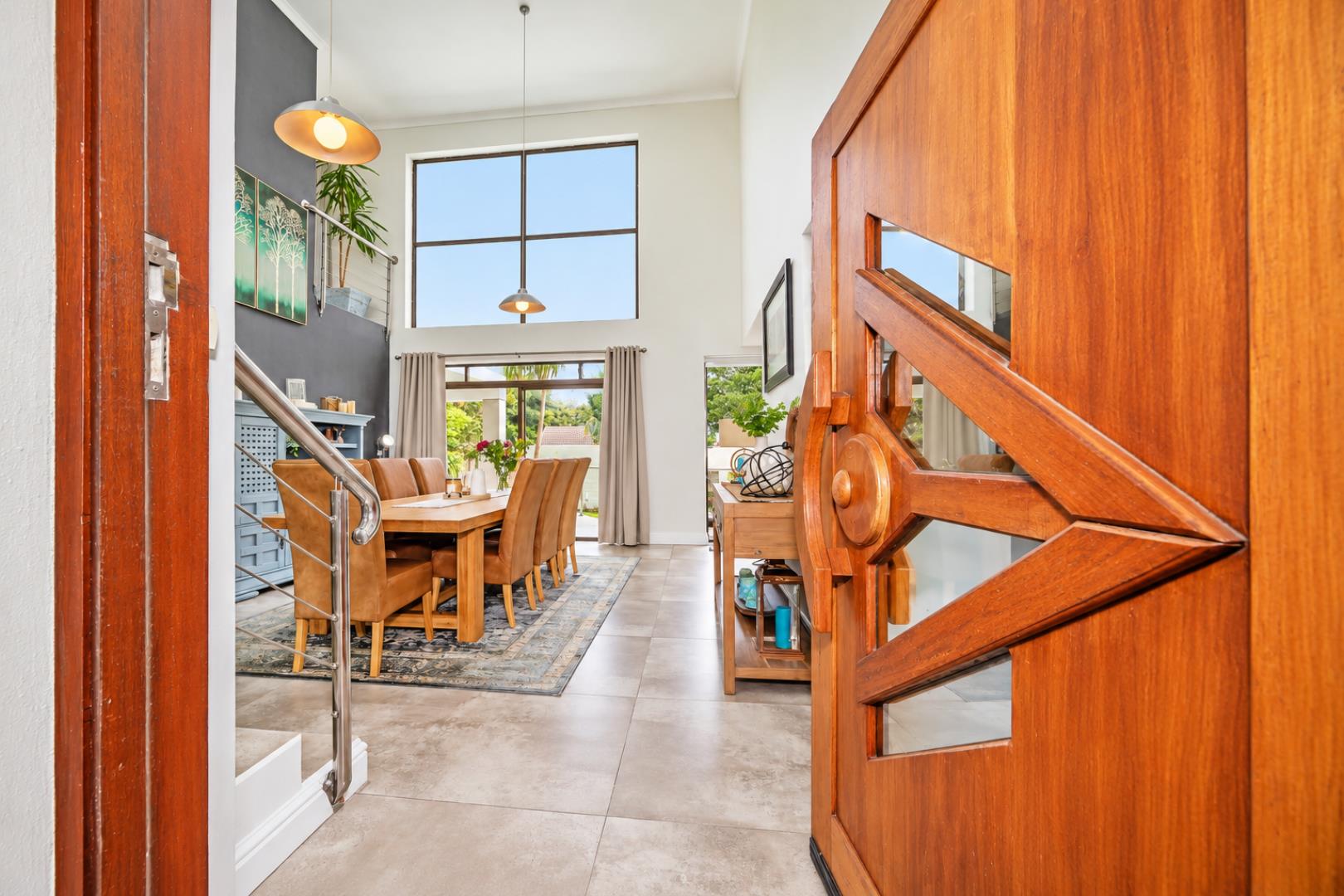 768744_Warm_Modern_Double-Height_Entryway.png