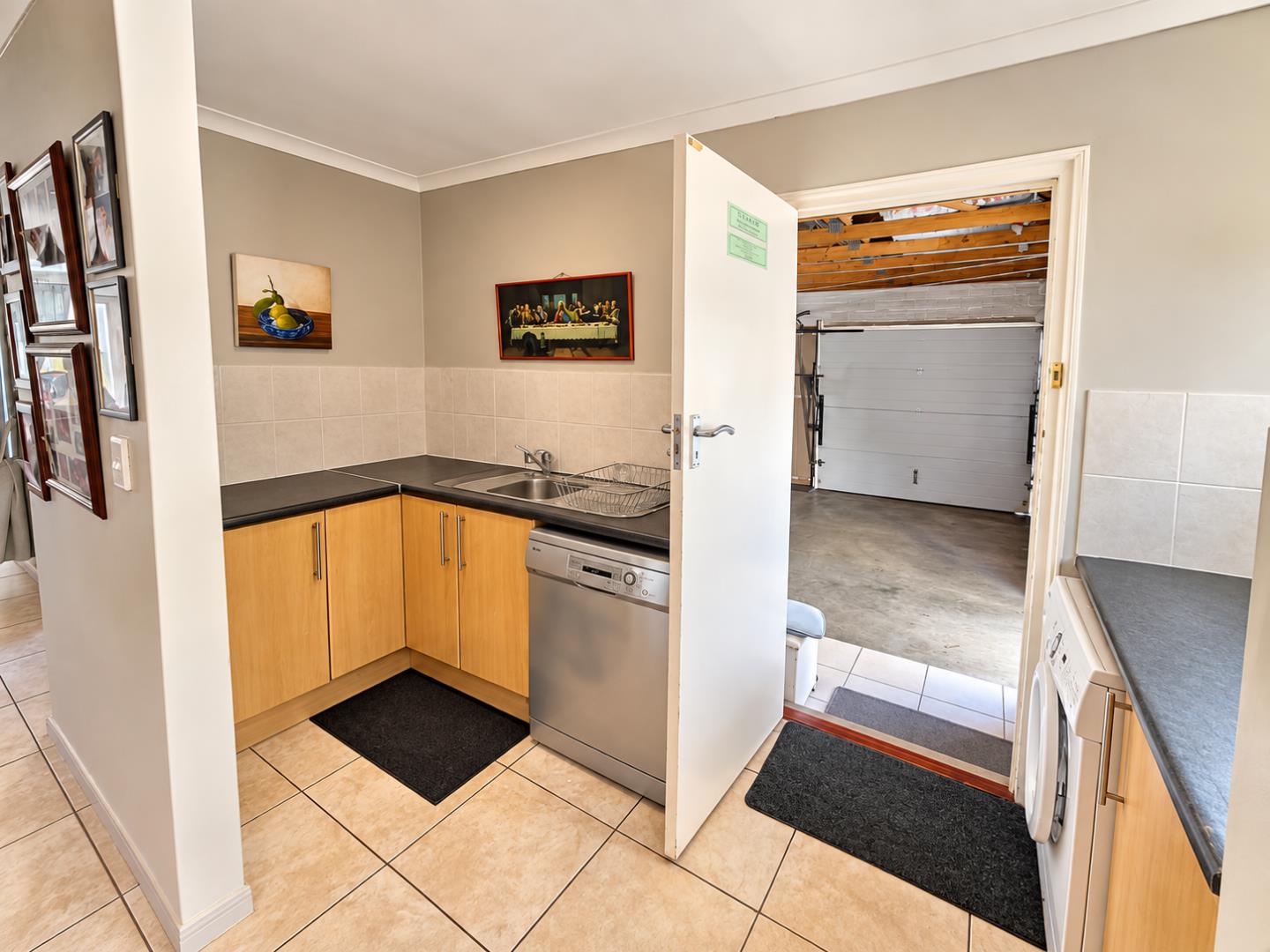 769441_Bright_Utility_Room_Leading_to_Garage.png