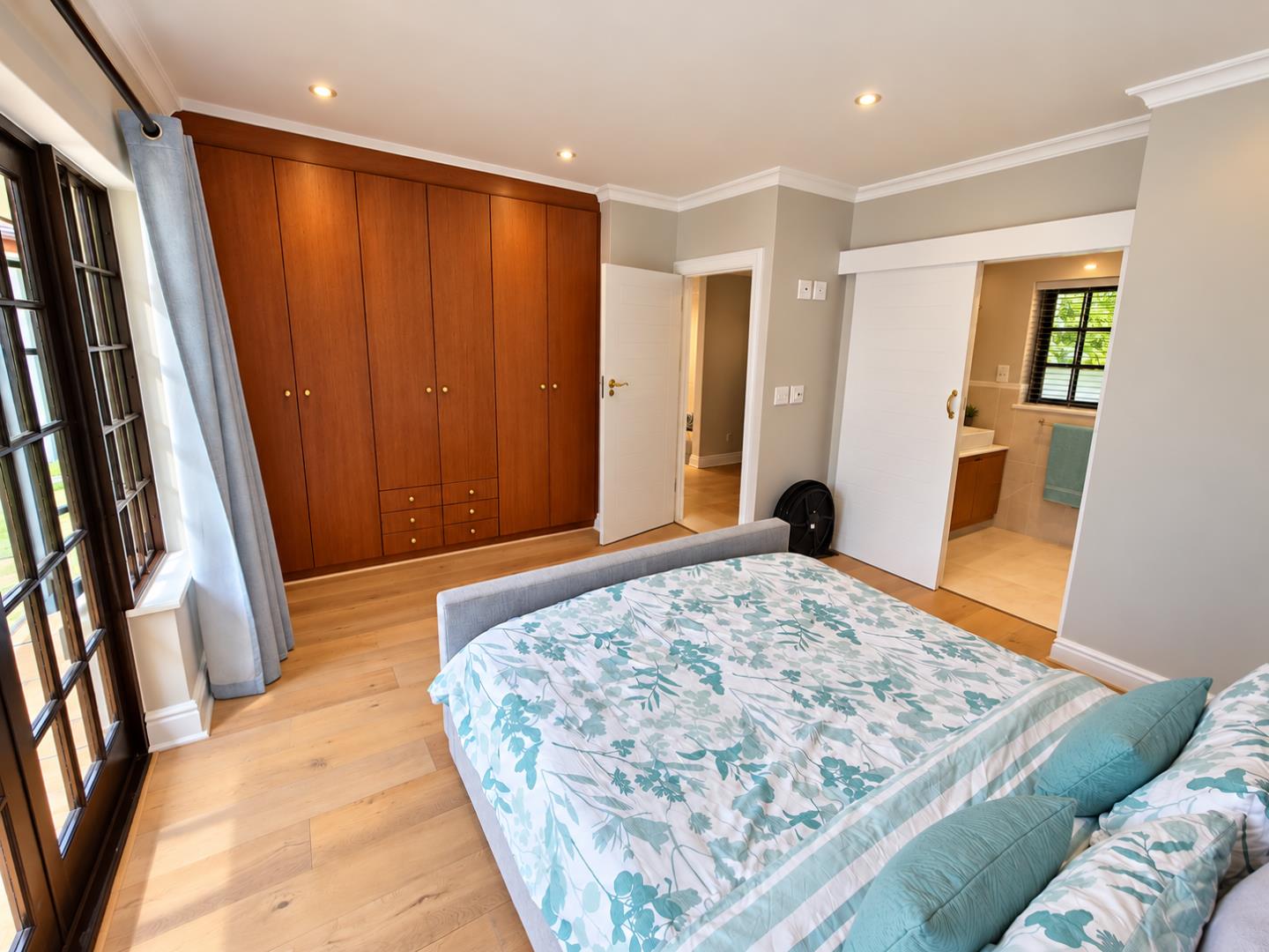 769572_Sunlit_Teal_Bedroom_and_Ensuite.png