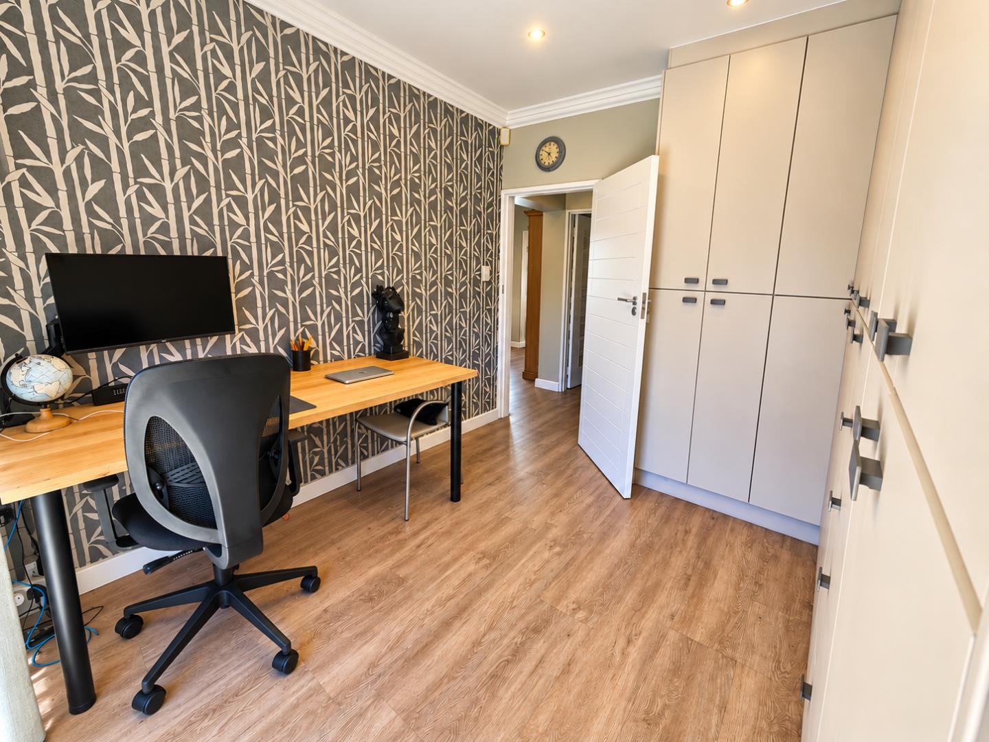 769820_Bright_Modern_Home_Office_with_Patterned_Wall.png