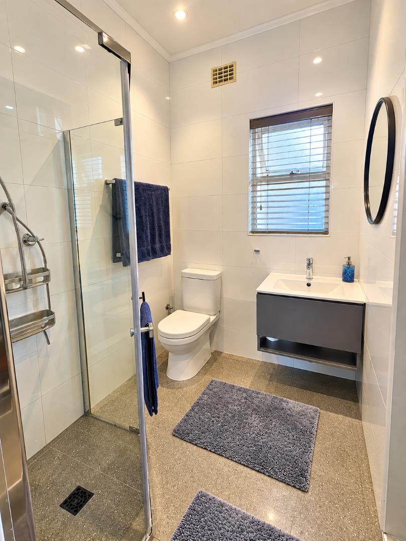 769820_Modern_Bathroom_with_Blue_Accents.png