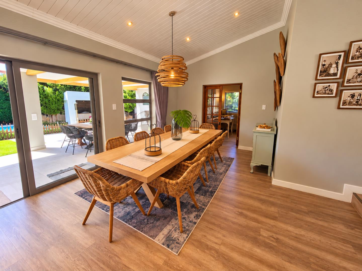 769820_Sunlit_Wicker_Dining_Room_and_Patio_View.png
