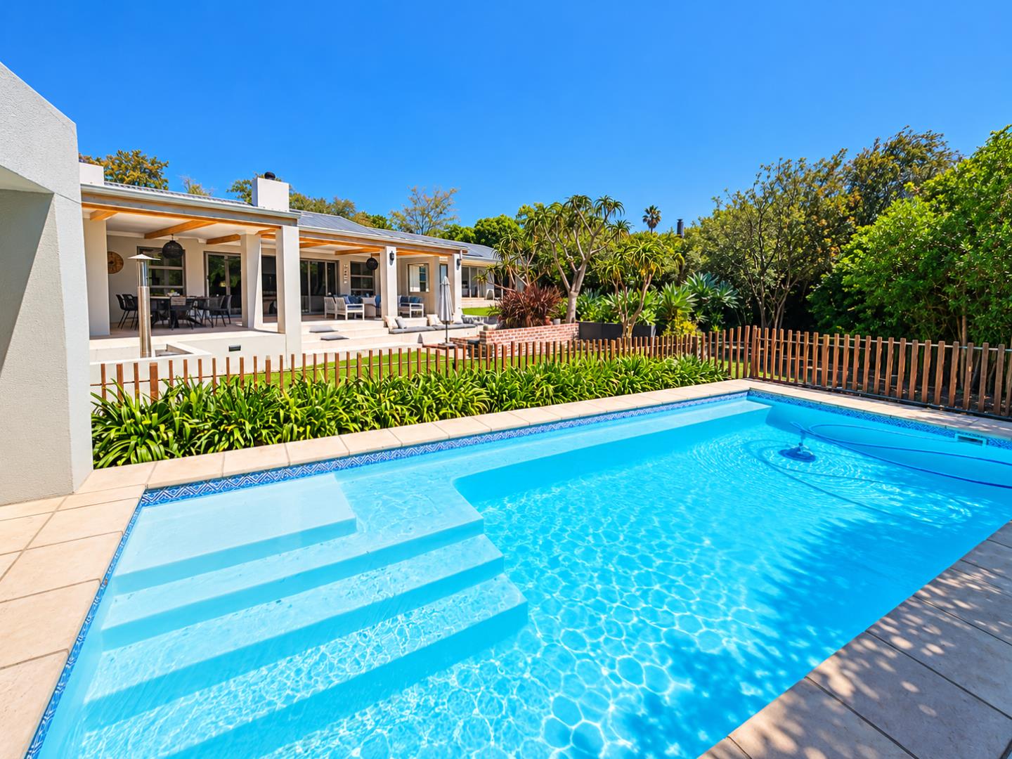 769820_Sunny_Modern_Patio_with_Sparkling_Pool.png